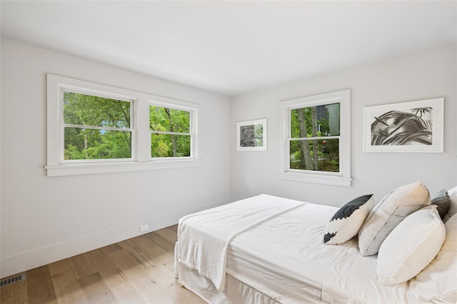 69 Bay View Dr W, Sag Harbor, NY 11963 - bedroom with wood finished floors and baseboards