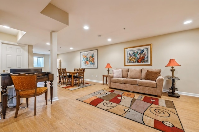 174 Spring Dr Unit 174, East Meadow, NY 11554 - living area featuring light wood-style floors, baseboards, and recessed lighting