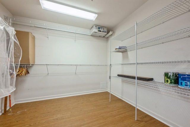 174 Spring Dr Unit 174, East Meadow, NY 11554 - spacious closet with light wood finished floors