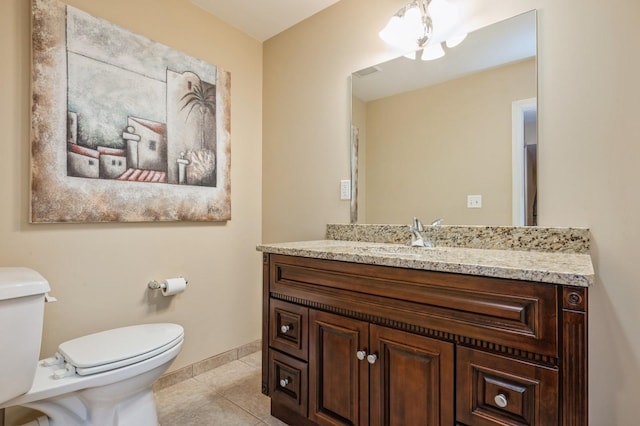 174 Spring Dr Unit 174, East Meadow, NY 11554 - bathroom featuring toilet, vanity, and tile patterned flooring