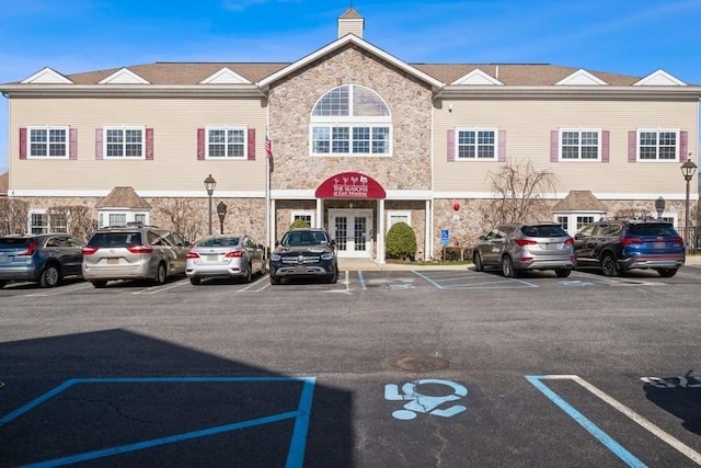 174 Spring Dr Unit 174, East Meadow, NY 11554 - view of property with uncovered parking