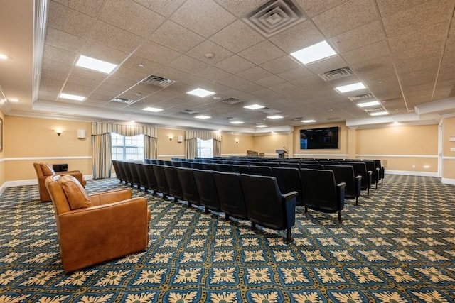 174 Spring Dr Unit 174, East Meadow, NY 11554 - cinema room with carpet flooring, baseboards, crown molding, and a drop ceiling