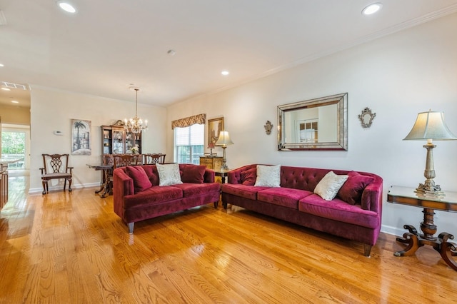 174 Spring Dr Unit 174, East Meadow, NY 11554 - living room featuring light wood finished floors, healthy amount of natural light, a chandelier, recessed lighting, and baseboards