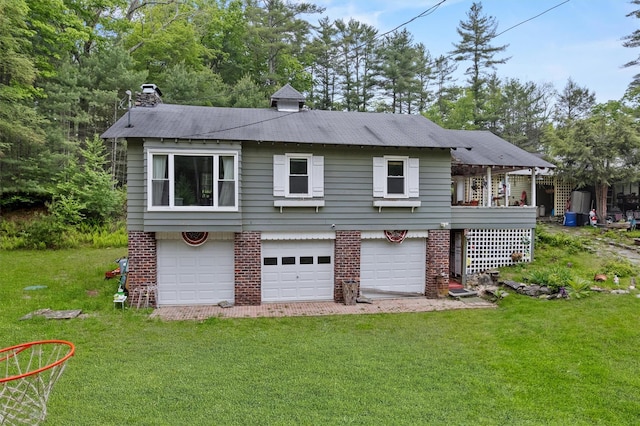11 Waldweg Dr, Sparrowbush, NY 12780 - back of property with a chimney, a yard, and brick siding
