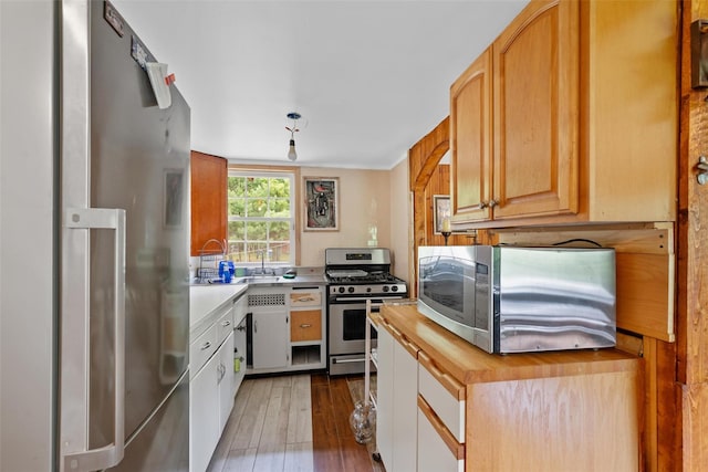 11 Waldweg Dr, Sparrowbush, NY 12780 - kitchen featuring stainless steel appliances, hardwood / wood-style flooring, and wooden counters