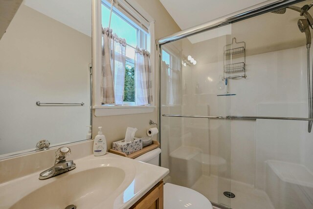 370 Pheasant Pl, Greenport, NY 11944 - bathroom with a shower stall, vanity, and toilet