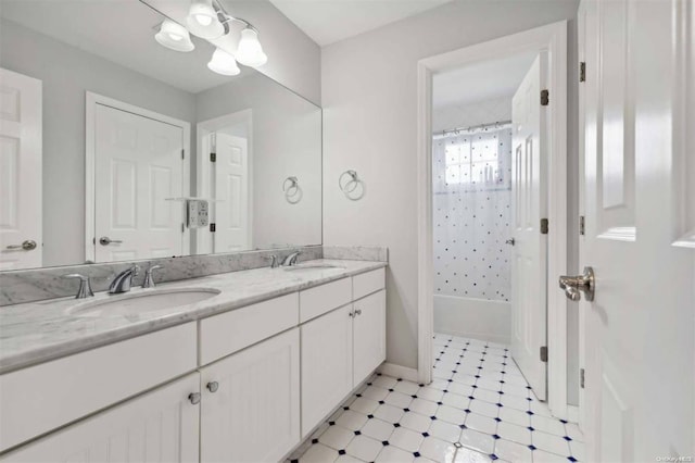 55 Hamptons Court Dr E Unit 55, Eastport, NY 11941 - bathroom featuring double vanity, shower / tub combo with curtain, and tile patterned floors