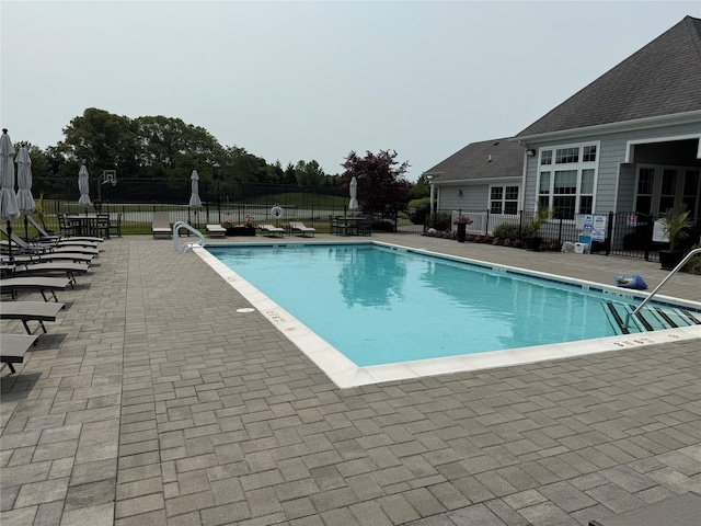 55 Hamptons Court Dr E Unit 55, Eastport, NY 11941 - community pool with a patio