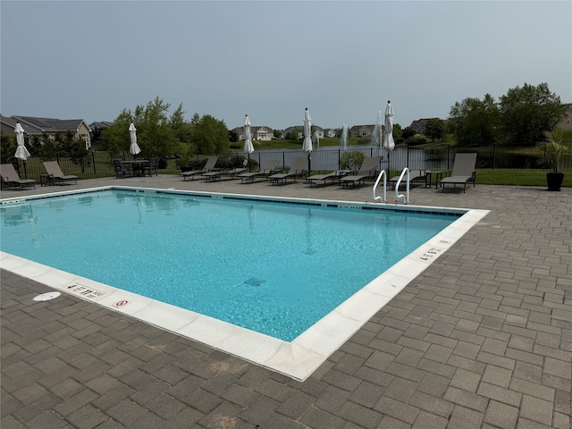 55 Hamptons Court Dr E Unit 55, Eastport, NY 11941 - community pool with a patio