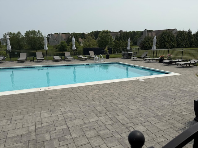 55 Hamptons Court Dr E Unit 55, Eastport, NY 11941 - community pool featuring a patio