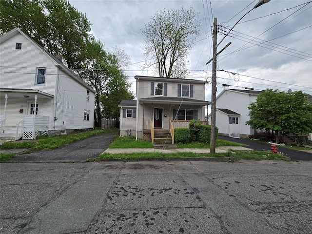 27 Thompson St, Port Jervis, NY 12771 - traditional home featuring a porch