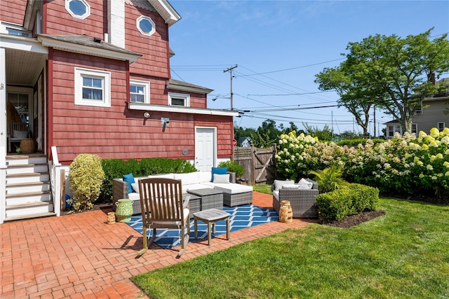 28 Shore Rd, Babylon, NY 11702 - view of patio featuring an outdoor living space and a gate