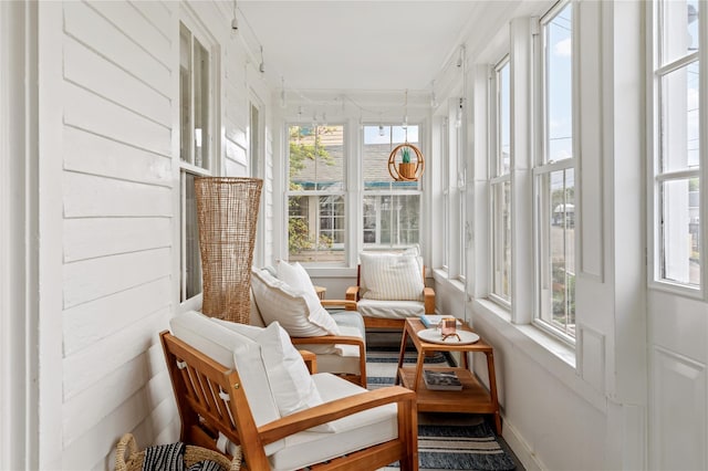 28 Shore Rd, Babylon, NY 11702 - sunroom featuring baseboards