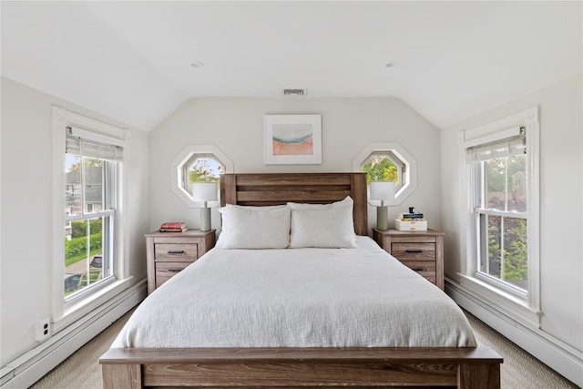 28 Shore Rd, Babylon, NY 11702 - carpeted bedroom featuring a baseboard heating unit, vaulted ceiling, and multiple windows