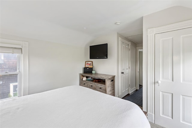 28 Shore Rd, Babylon, NY 11702 - bedroom featuring vaulted ceiling and baseboards