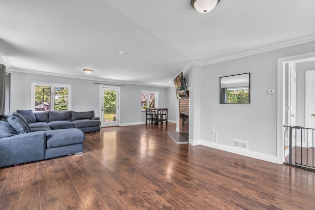 167 Grandview Ave, Nanuet, NY 10954 - living room with crown molding, wood finished floors, and a fireplace