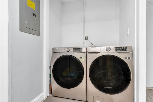 167 Grandview Ave, Nanuet, NY 10954 - washroom featuring electric panel and washer and clothes dryer