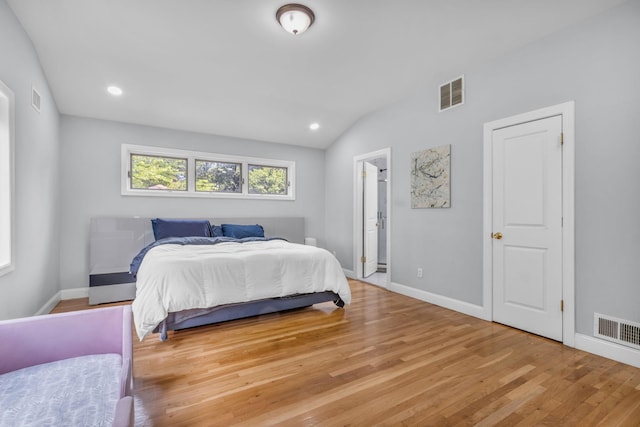 167 Grandview Ave, Nanuet, NY 10954 - bedroom with light wood-type flooring, lofted ceiling, and recessed lighting