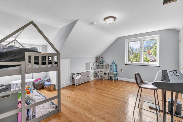 167 Grandview Ave, Nanuet, NY 10954 - bedroom featuring vaulted ceiling and wood finished floors