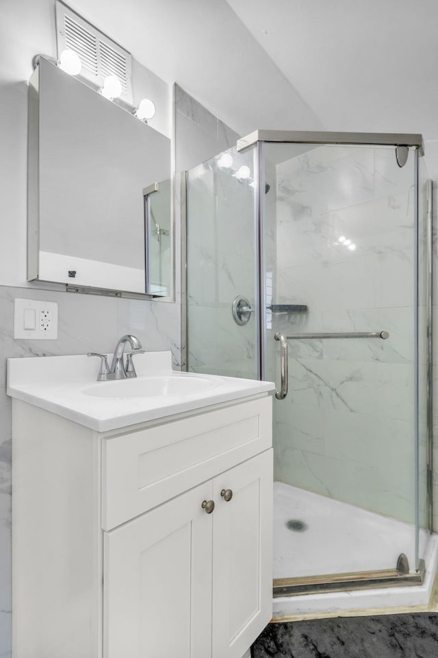 167 Grandview Ave, Nanuet, NY 10954 - full bathroom featuring vanity and a marble finish shower