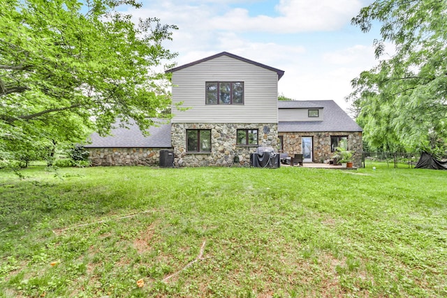 167 Grandview Ave, Nanuet, NY 10954 - back of house with stone siding and a patio area