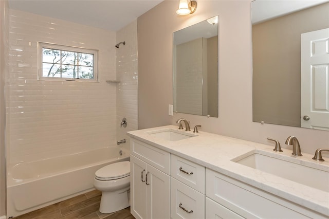 118 Broadway, Massapequa Park, NY 11762 - full bath with toilet, shower / washtub combination, double vanity, and wood finished floors