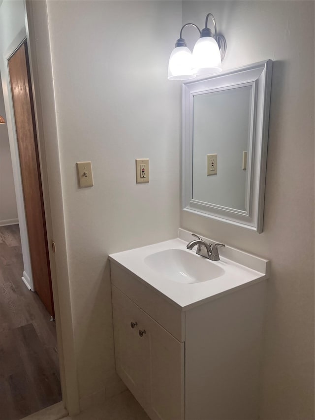 228 Concord Ln, Middletown, NY 10940 - bathroom with vanity and wood finished floors