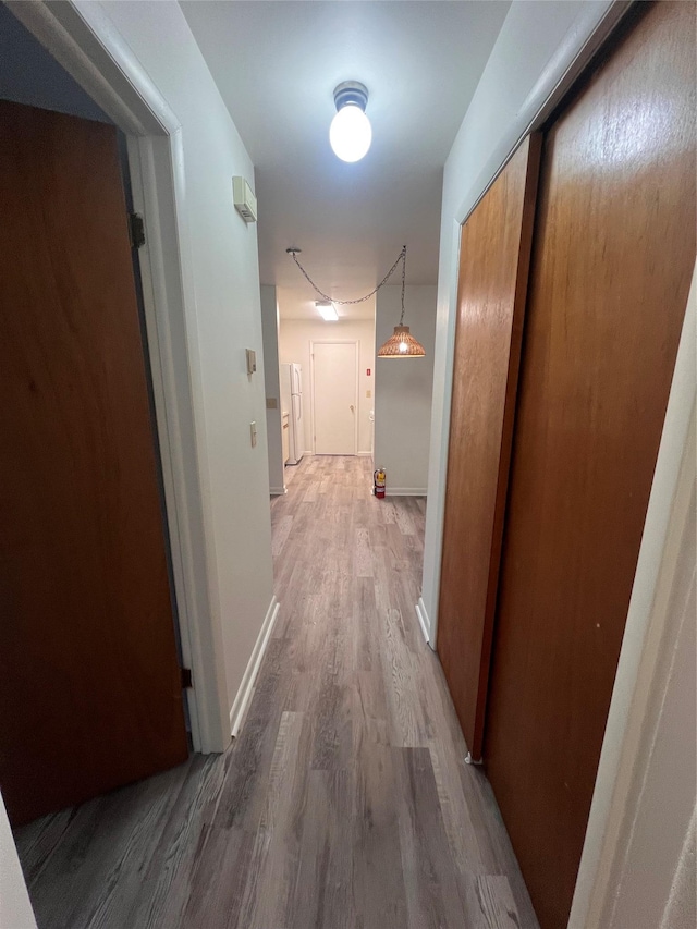 228 Concord Ln, Middletown, NY 10940 - hall featuring wood finished floors and baseboards