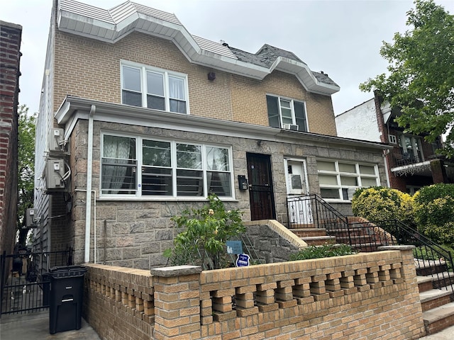 313 88th St, Brooklyn, NY 11209 - view of front facade with brick siding and stone siding