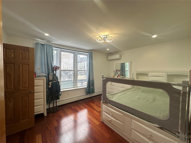 313 88th St, Brooklyn, NY 11209 - bedroom with an AC wall unit, dark wood-style floors, and recessed lighting