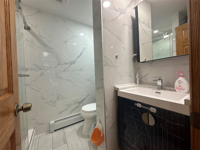 313 88th St, Brooklyn, NY 11209 - full bathroom with a baseboard radiator, toilet, vanity, and tile walls