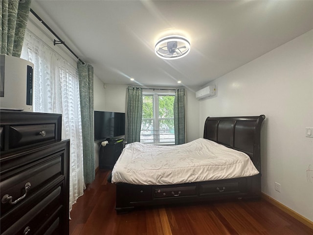 313 88th St, Brooklyn, NY 11209 - bedroom with dark wood-style floors, a wall mounted AC, and baseboards