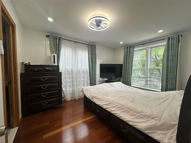 313 88th St, Brooklyn, NY 11209 - bedroom with dark wood-style flooring and recessed lighting