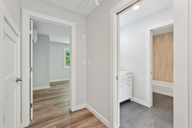 10 De Clark Pl, Nanuet, NY 10954 - hallway featuring baseboards and a wall mounted air conditioner