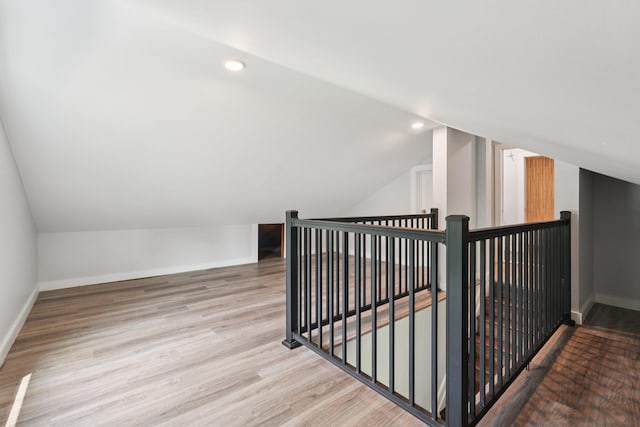 10 De Clark Pl, Nanuet, NY 10954 - additional living space with lofted ceiling, wood finished floors, and recessed lighting