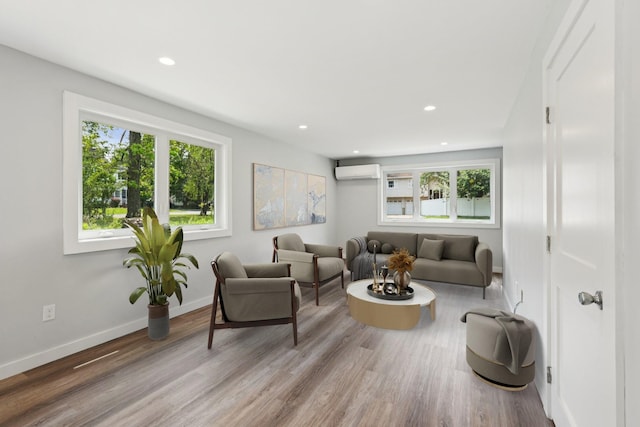10 De Clark Pl, Nanuet, NY 10954 - living area featuring a wall mounted air conditioner, recessed lighting, and wood finished floors