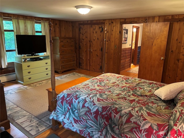 15 Orchard Rd, Poughkeepsie, NY 12603 - bedroom featuring a baseboard radiator and wood walls