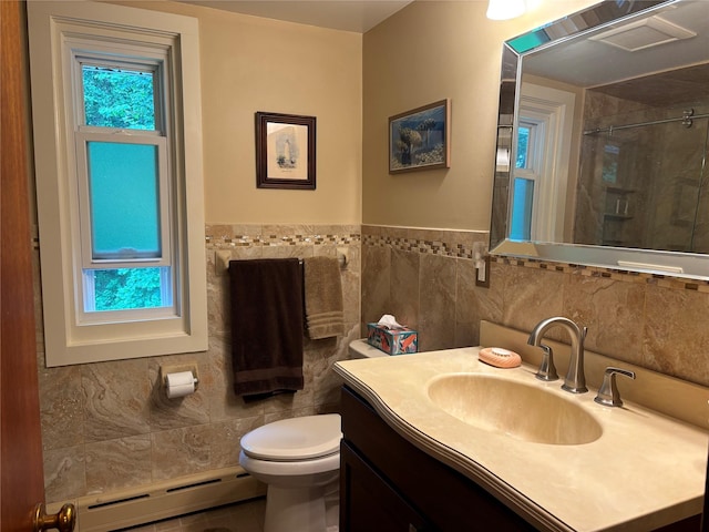 15 Orchard Rd, Poughkeepsie, NY 12603 - full bath featuring baseboard heating, a shower, toilet, vanity, and tile walls