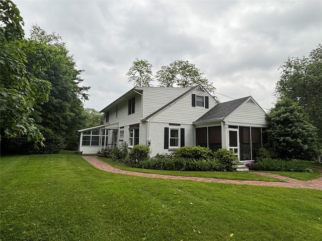 15 Orchard Rd, Poughkeepsie, NY 12603 - traditional home with a sunroom and a front lawn