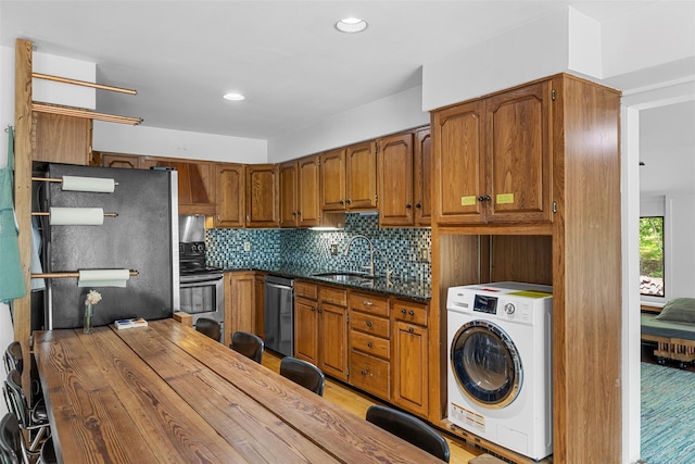 15 Relyea Ter, Wappingers Falls, NY 12590 - kitchen with washer / clothes dryer, appliances with stainless steel finishes, a sink, brown cabinets, and recessed lighting