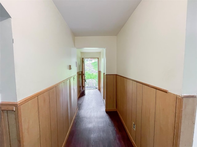 94 Highland Ave, Woodridge, NY 12789 - corridor featuring wainscoting, dark wood-style floors, and wooden walls