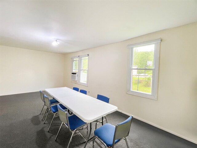 94 Highland Ave, Woodridge, NY 12789 - dining area featuring carpet, baseboards, and cooling unit