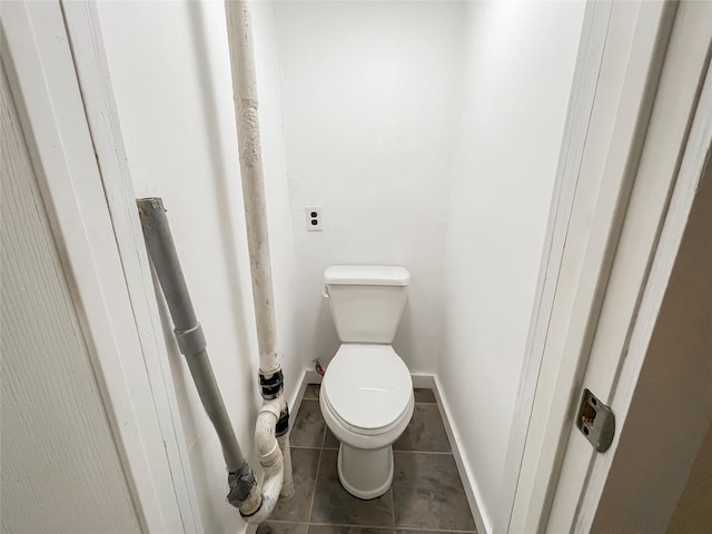 94 Highland Ave, Woodridge, NY 12789 - bathroom with toilet, tile patterned flooring, and baseboards