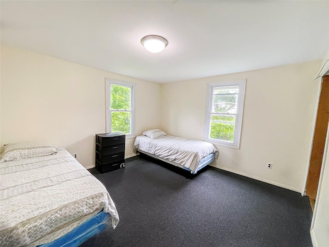 94 Highland Ave, Woodridge, NY 12789 - bedroom featuring multiple windows and baseboards