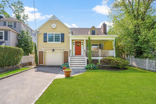 4 Senate Pl, Larchmont, NY 10538 - view of front facade with asphalt driveway, a chimney, covered porch, an attached garage, and brick siding