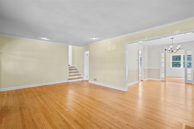 4 Senate Pl, Larchmont, NY 10538 - unfurnished room featuring crown molding, a chandelier, light wood finished floors, and stairway