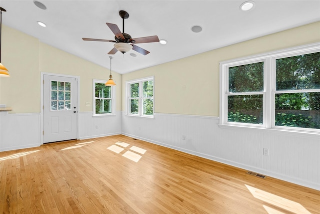 4 Senate Pl, Larchmont, NY 10538 - unfurnished room with wainscoting, light wood-style floors, ceiling fan, vaulted ceiling, and recessed lighting