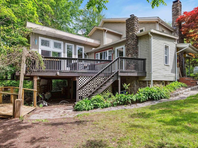 5221-5223 Rte 28, Mount Tremper, NY 12457 - back of property with stairs, a deck, a chimney, and a yard