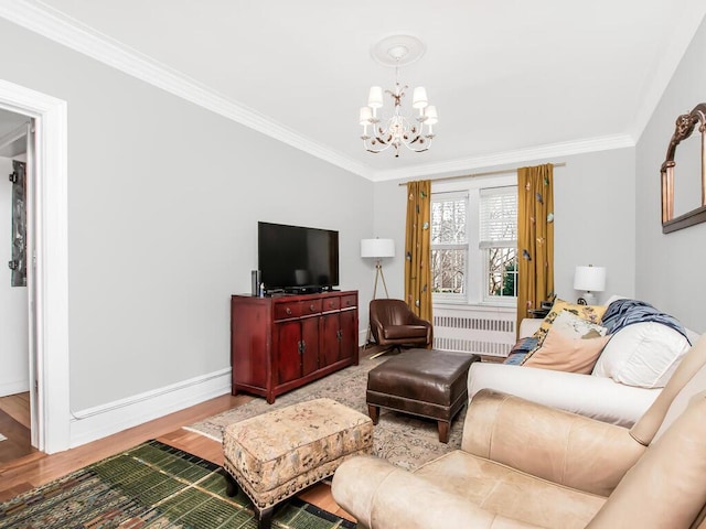 525 W 238th St Unit 1L, Bronx, NY 10463 - living area with radiator heating unit, a chandelier, wood finished floors, ornamental molding, and baseboards