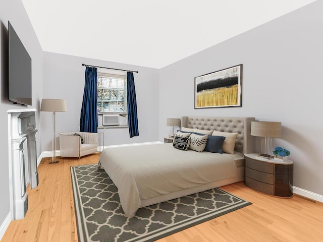525 W 238th St Unit 1L, Bronx, NY 10463 - bedroom featuring light wood-style flooring, baseboards, and cooling unit